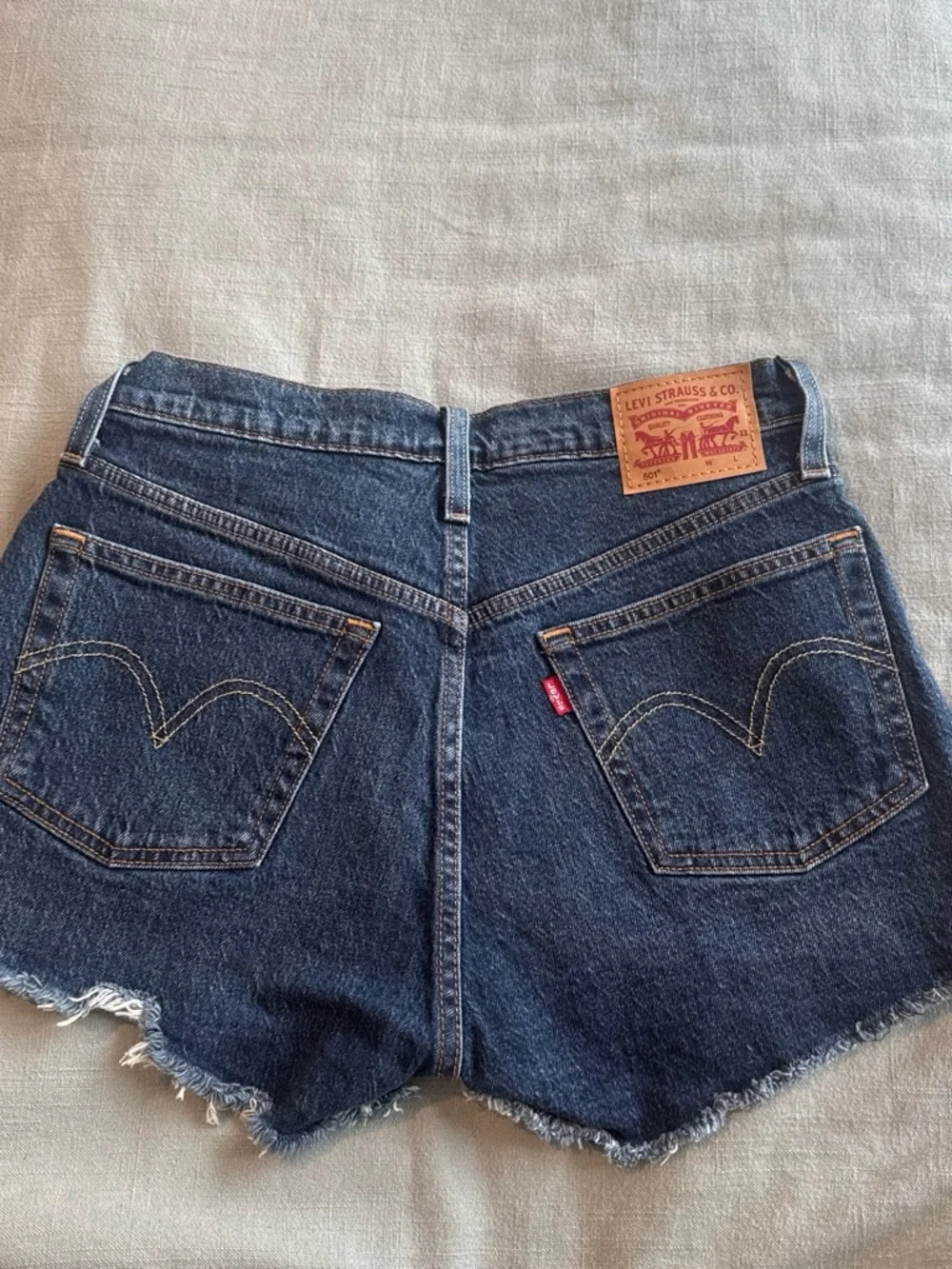 Levi's Dark Blue Distressed Denim Cutoff Shorts